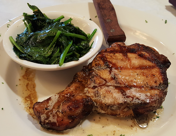 Low Carb Restaurant Options: Pork Chop with Sauteed Spinach at Louisiana Bistreaux
